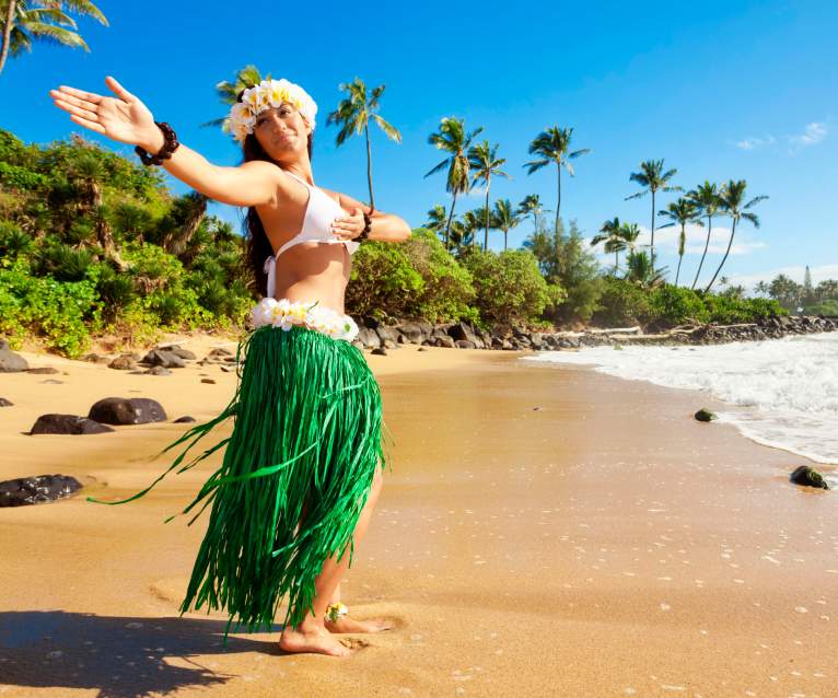 A hula dancer on a Hawaiian beach