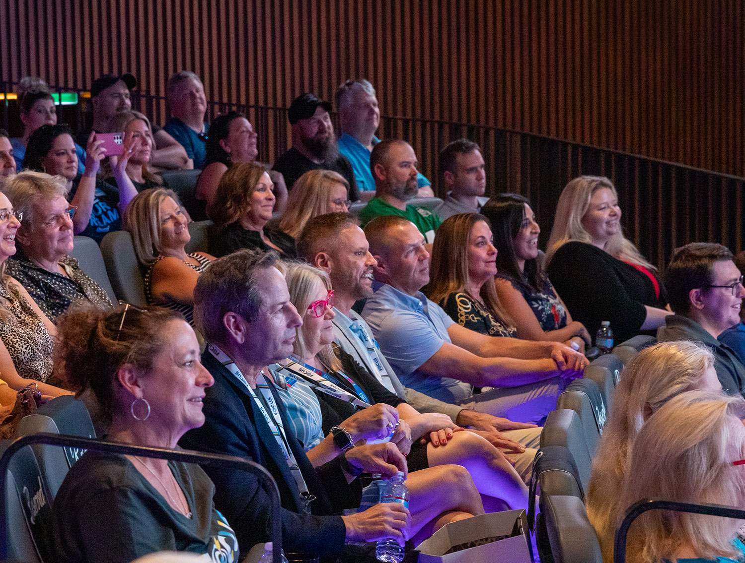 group of people in an auditorium for training