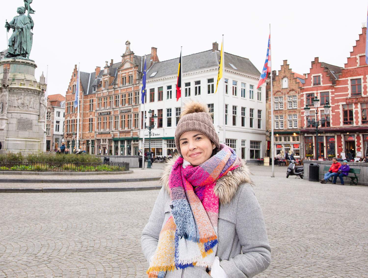 woman bundled up in a square